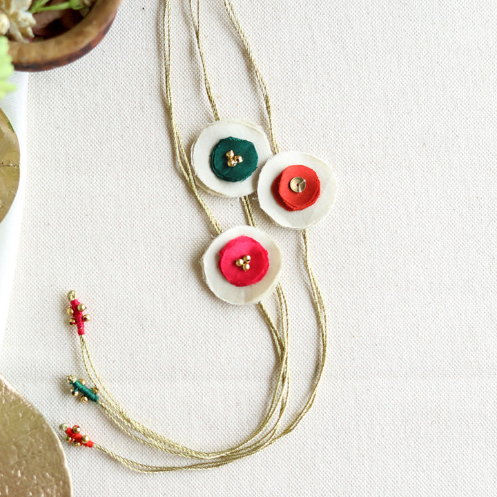 Handmade Reusable Dual Layer Upcycled Fabric Rakhi With Roli Chawal For Brother Set Of 3 - Full Length Product Layout