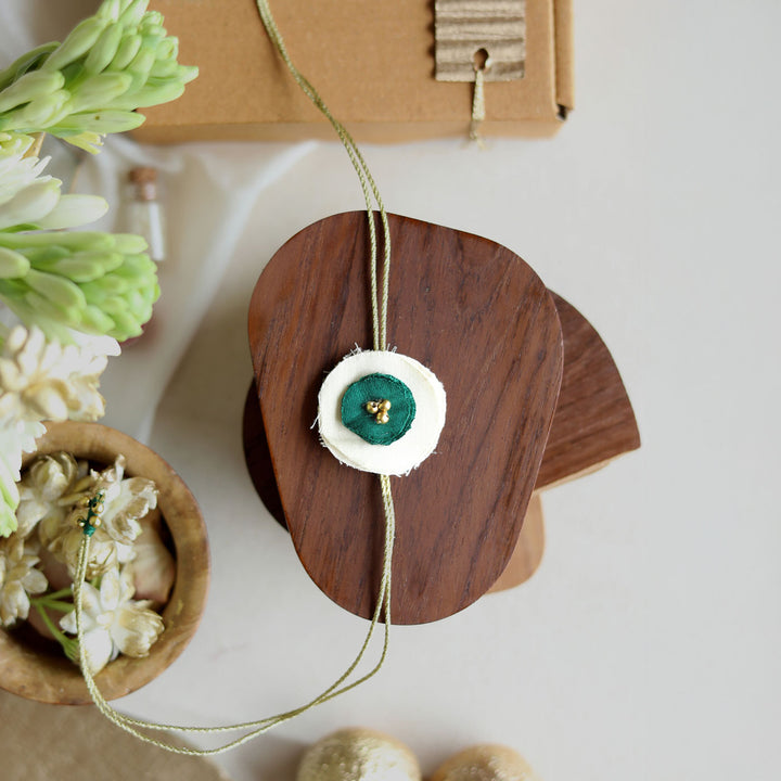 Handmade Reusable Dual Layer Upcycled Fabric Rakhi With Roli Chawal For Brother - Full length green and white rakhi