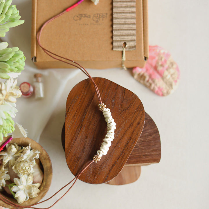 Handmade Reusable Beaded Ruched Upcycled Fabric Rakhi With Roli Chawal For Brother - Front View with Packaging