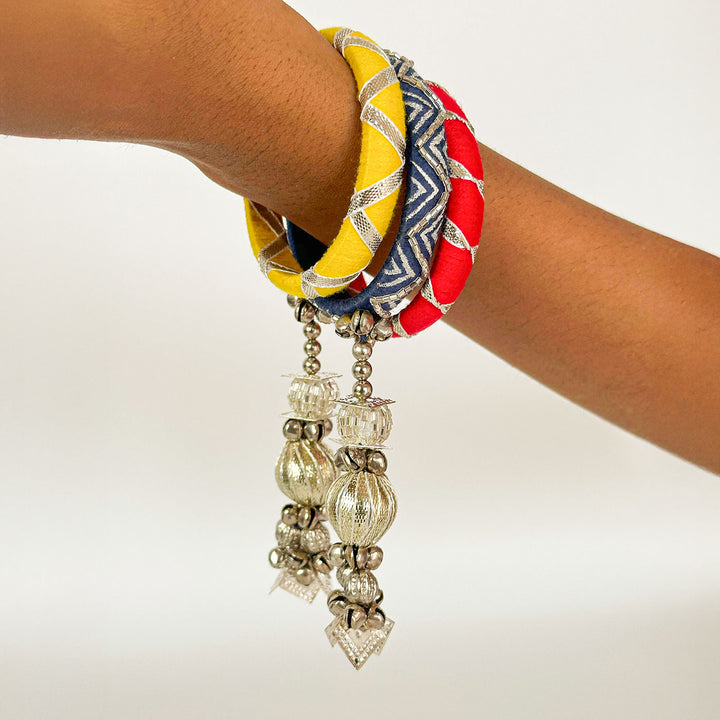 Handmade Beaded Traditional Ghungroo And Zari Cotton Bangle Lumba With Roli Chawal For Bhabhi - Close-up Wearing on Arm