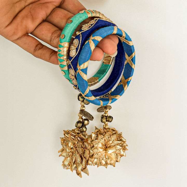 Handmade Beaded Traditional Ghungroo And Flower Cotton Bangle Lumba With Roli Chawal For Bhabhi - Hand Holding Bangles