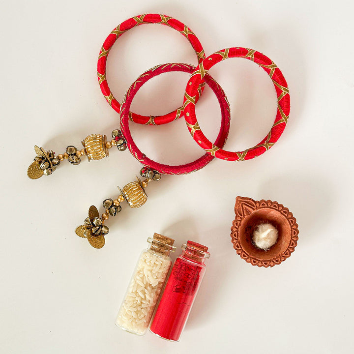 Handmade Beaded Pink Traditional Ghungroo And Zari Cotton Bangle Lumba With Roli Chawal For Bhabhi - Bangles with Festive Items Display