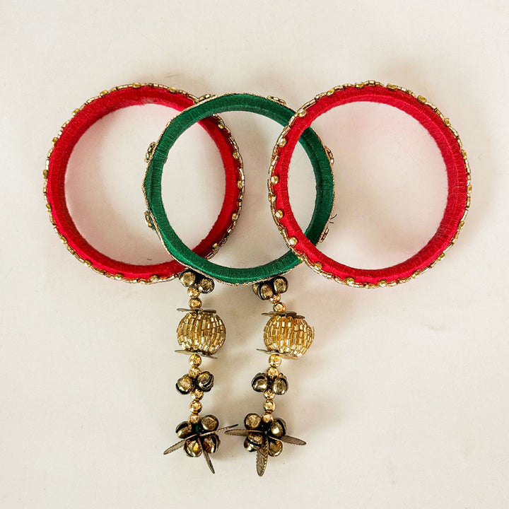 Handmade Beaded Red Green Ghungroo Cotton Bangle Lumba With Roli Chawal For Bhabhi - Front View Display