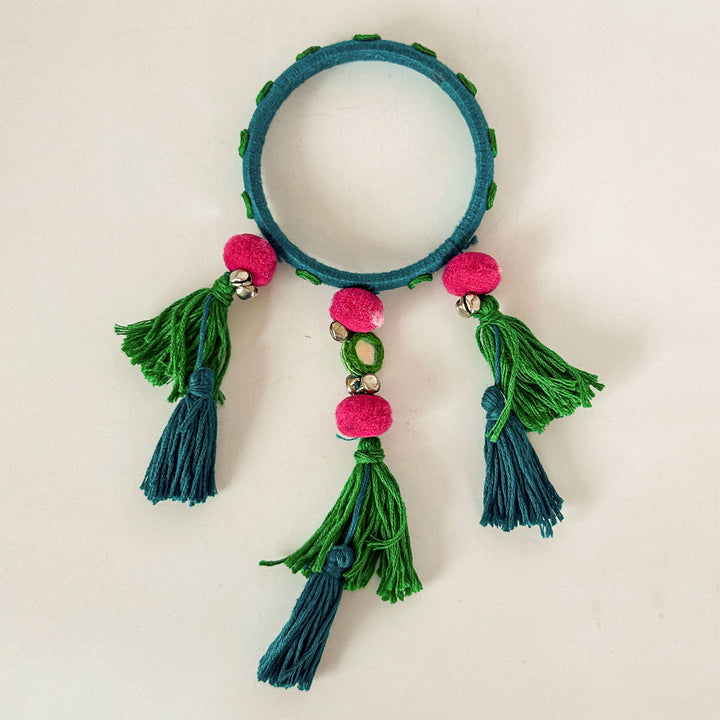 Handmade Beaded Blue Ghungroo And Mirror Cotton Bangle Lumba With Roli Chawal For Bhabhi - Top View with Tassels