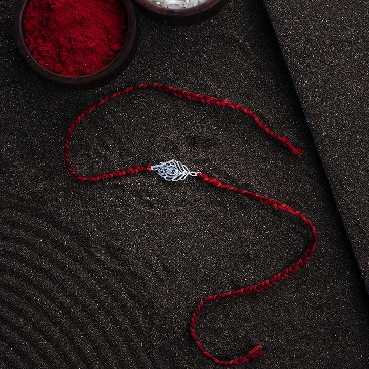 Handmade Peacock 925 Silver Rakhi With Roli Chawal For Brother - Full Product Layout on Surface