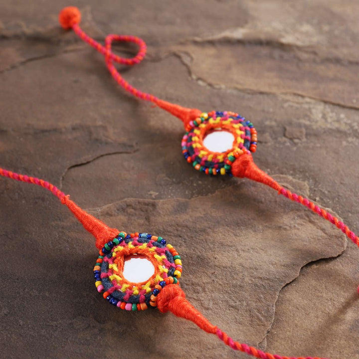 Handmade Mirror Work Rakhi With Roli Chawal Set Of 2 - Close-up of Bracelets