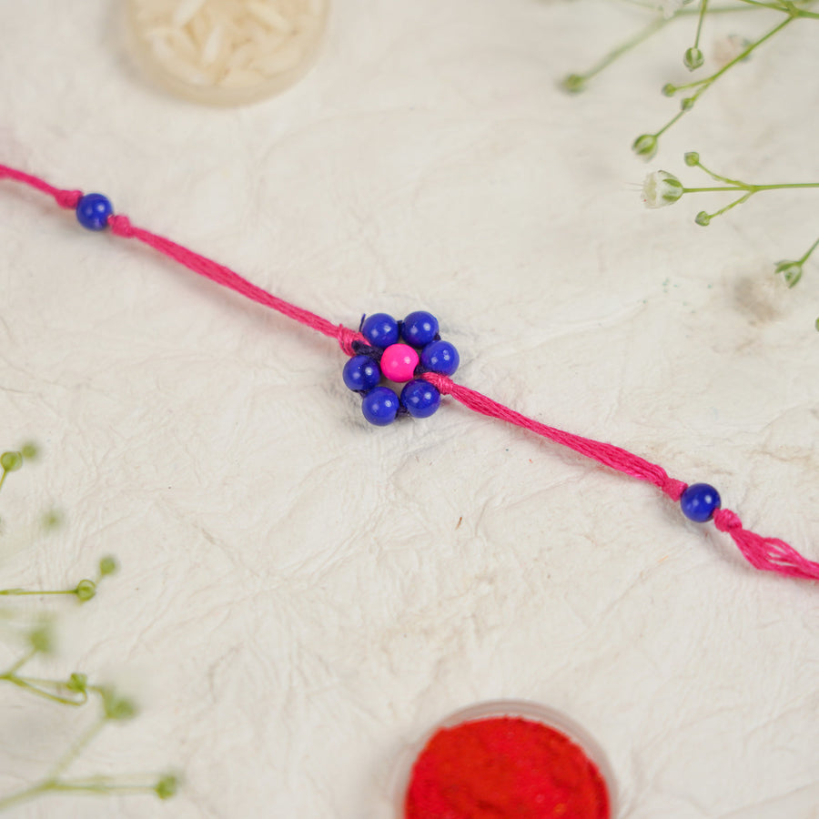 Handmade Beaded Flower Rakhi With Roli Chawal - Close-up of single bracelet