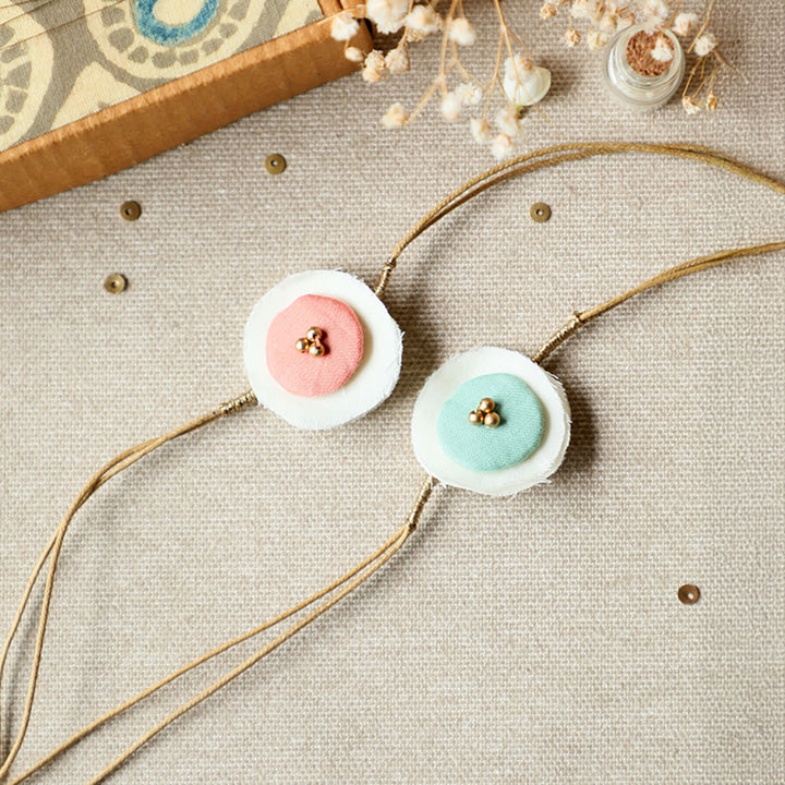 Handmade Reusable Layered Petal Beads Upcycled Fabric Rakhi With Roli Chawal For Brother Set Of 2 - Top View with Full Strings