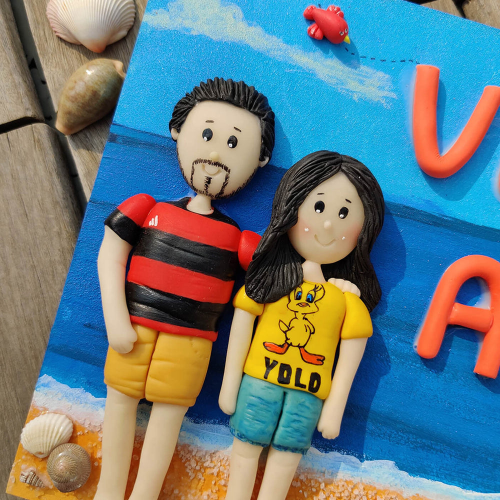 Handcrafted Personalized Clay Caricature Name Plate For Couples 1 - Close-up of Character Figurines