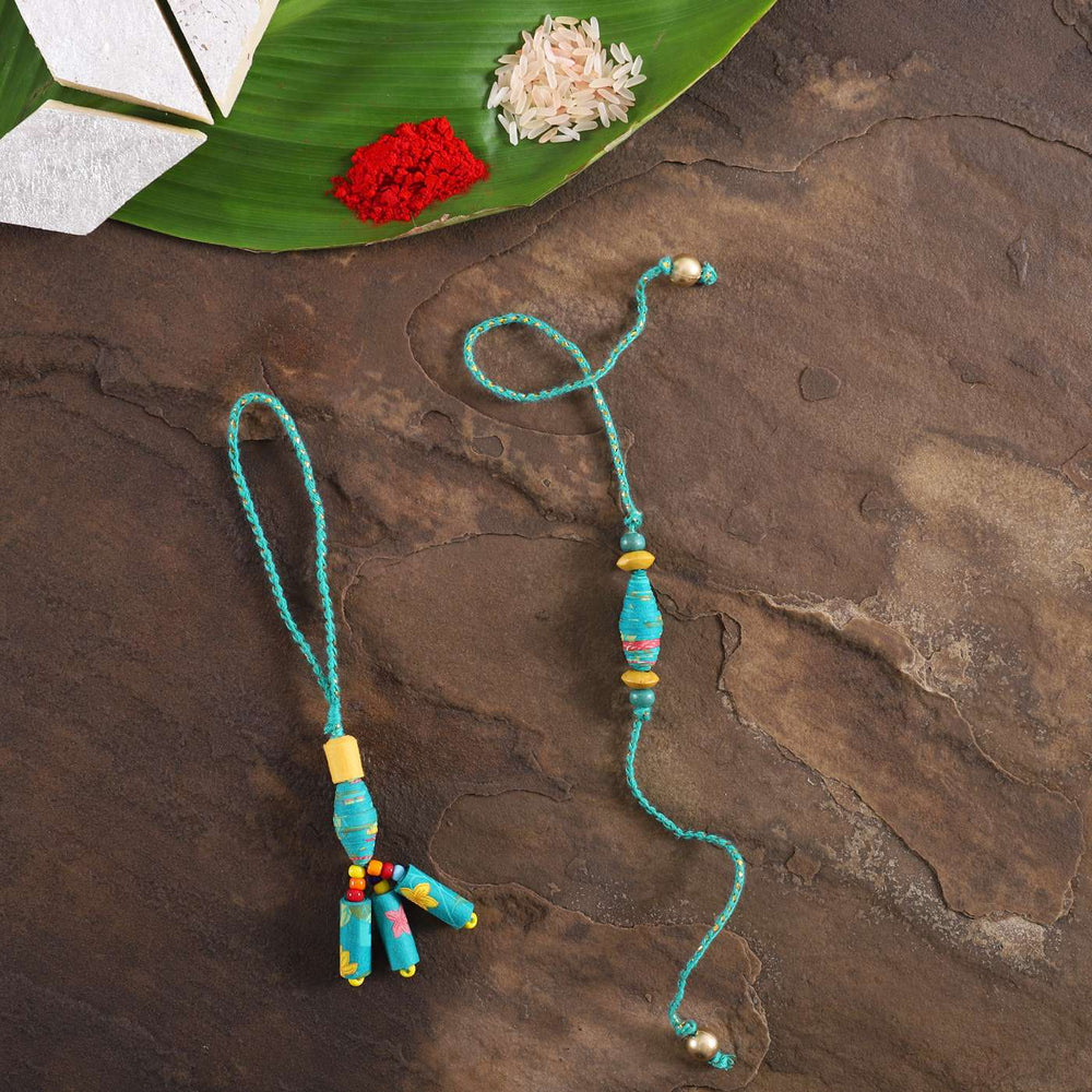 Handmade Beaded Paper Bead Bhaiya Bhabhi Rakhi With Roli Chawal Set Of 2 - Top View Showing Both Items