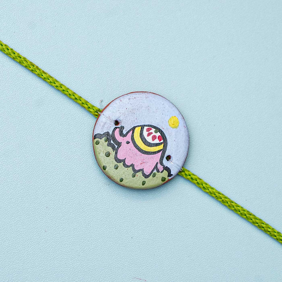 Personalized Animal Theme Terracotta Rakhi With Roli Chawal For Kids 4 - Close-up of Rakhi Design
