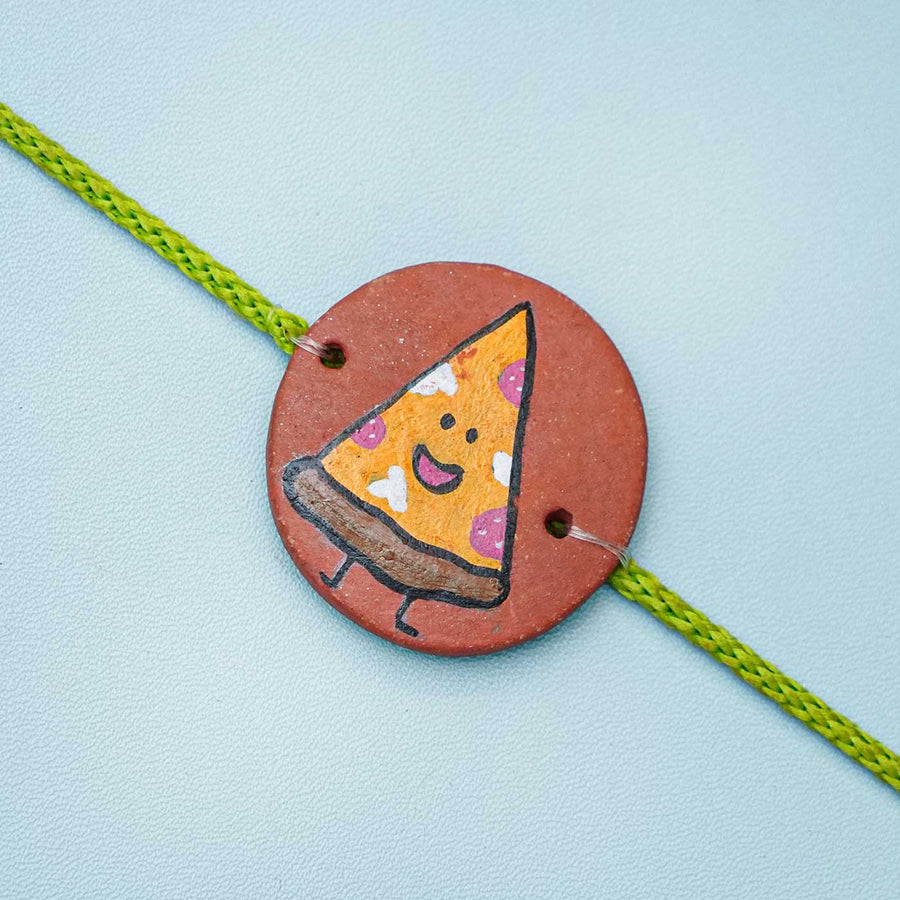 Personalized Food Theme Terracotta Rakhi With Roli Chawal 1 - Close-up Front View