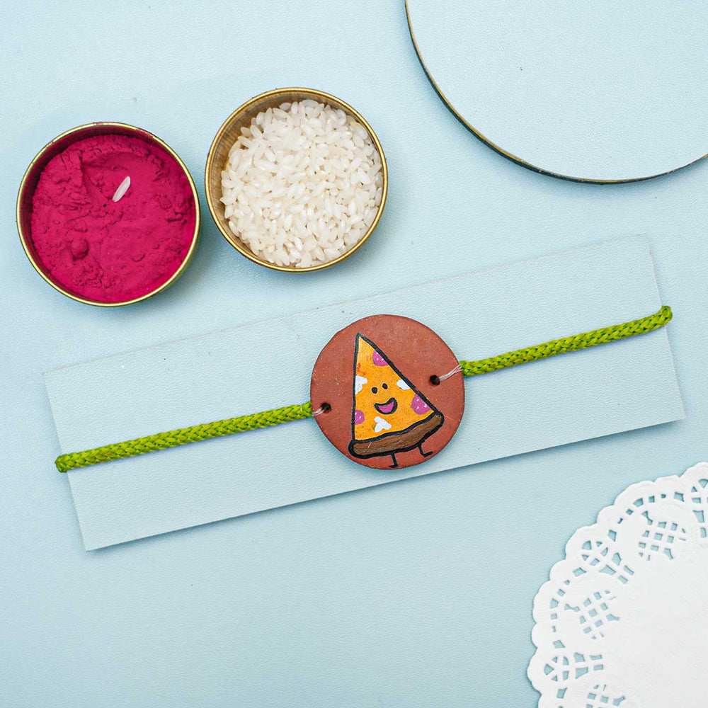 Personalized Food Theme Terracotta Rakhi With Roli Chawal 1 - Styled Product Display with Accessories
