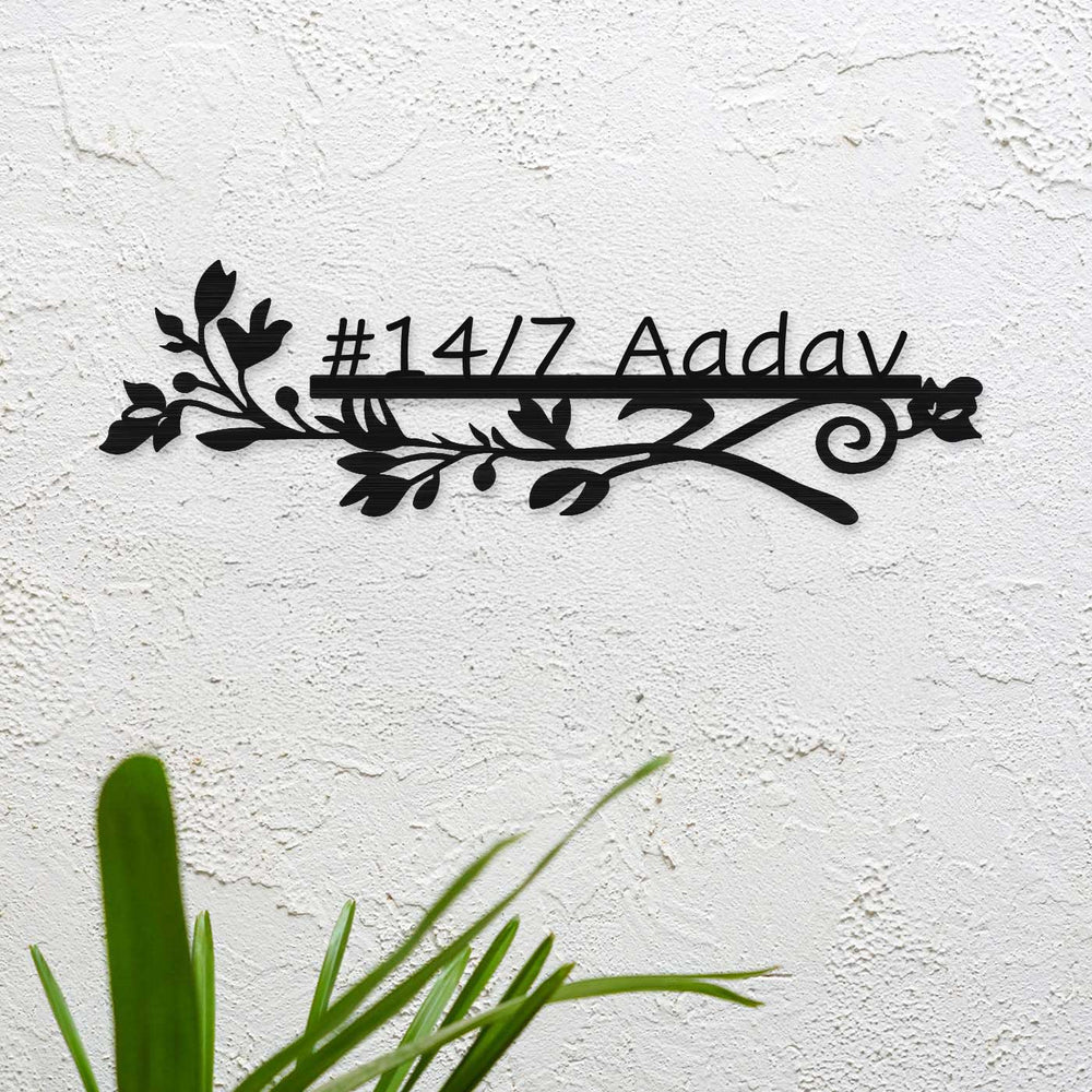 Personalized Laser Cut Sleek Floral Design Steel Name Plate - Mounted on Textured Wall
