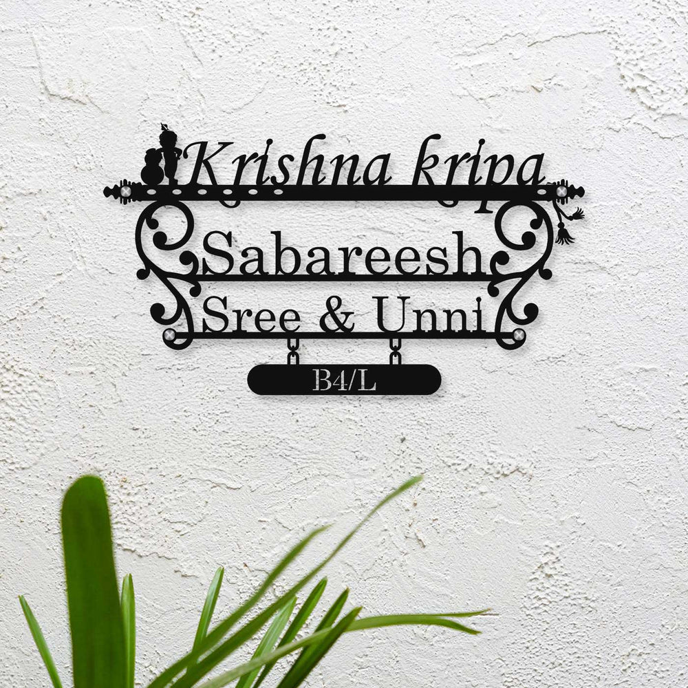 Personalized Laser Cut Little Krishna Theme Steel Name Plate - Mounted on White Wall Close-up