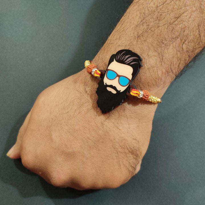 Handmade Printed Dashing Bhai Wooden Rudraksha Rakhi With Roli Chawal - Worn on Wrist Close-up