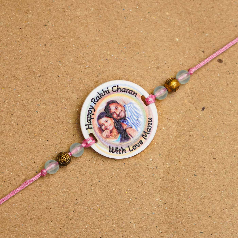 Photo Personalized Handmade Rainbow Acrylic Rakhi With Roli Chawal - Close-up of personalized rakhi