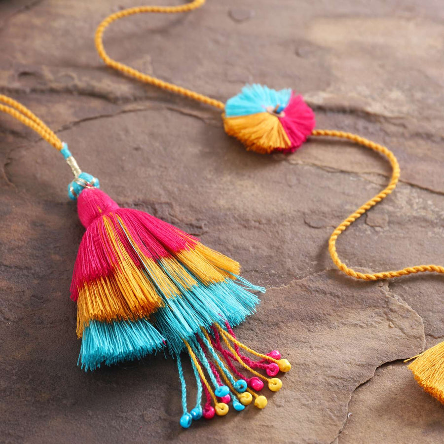 Handmade Beaded Rangrez Cotton Bhaiya Bhabhi Rakhi With Roli Chawal Set Of 2 - Close-up of tassel detail
