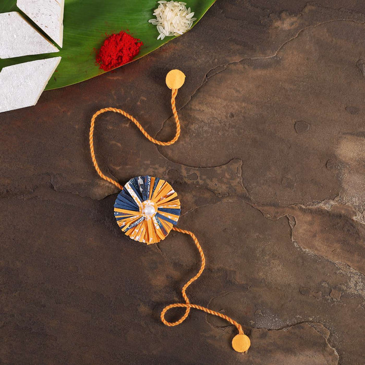 Handmade Ecofriendly Yellow Recycled Paper Rakhi With Roli Chawal - Styled with Traditional Elements