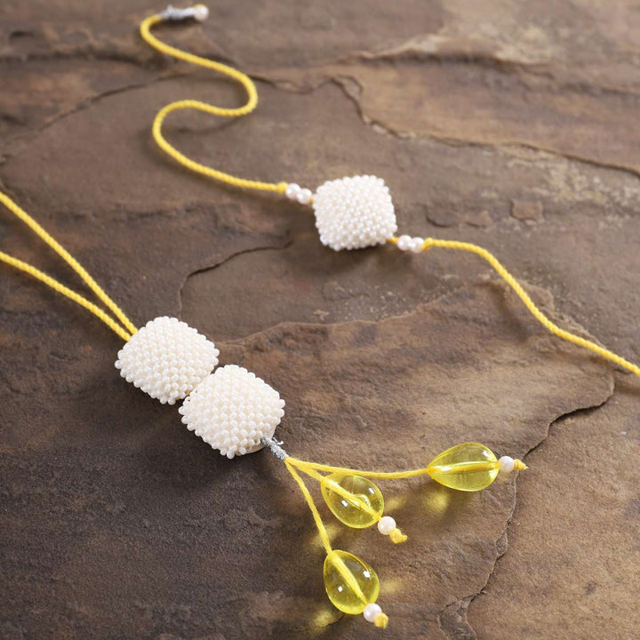 Handmade Square Pearls Bhaiya Bhabhi Rakhi With Roli Chawal Set Of 2 - Close-up Detail of Threaded Beads