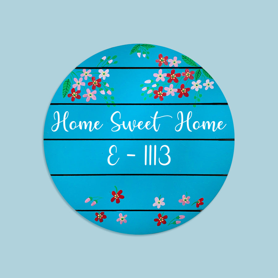 Hand Painted Floral Name Plate 1 - Front View on Blue Background