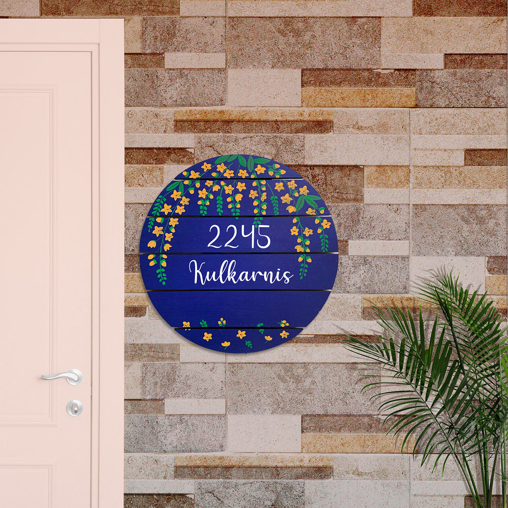 Round Hand Painted Madhubani Art Name Plate 9 - Mounted on Exterior Brick Wall