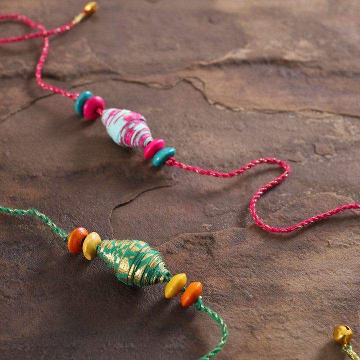 Handmade Beaded Paper Tubular Rakhi With Roli Chawal Set Of 2 - Close-up of bead details