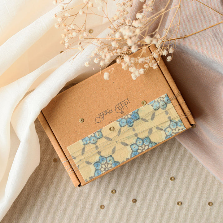 Handmade Reusable Layered Petal And Ghungroo Upcycled Fabric Rakhi With Roli Chawal For Brother - Packaging Box with Fabric Decor