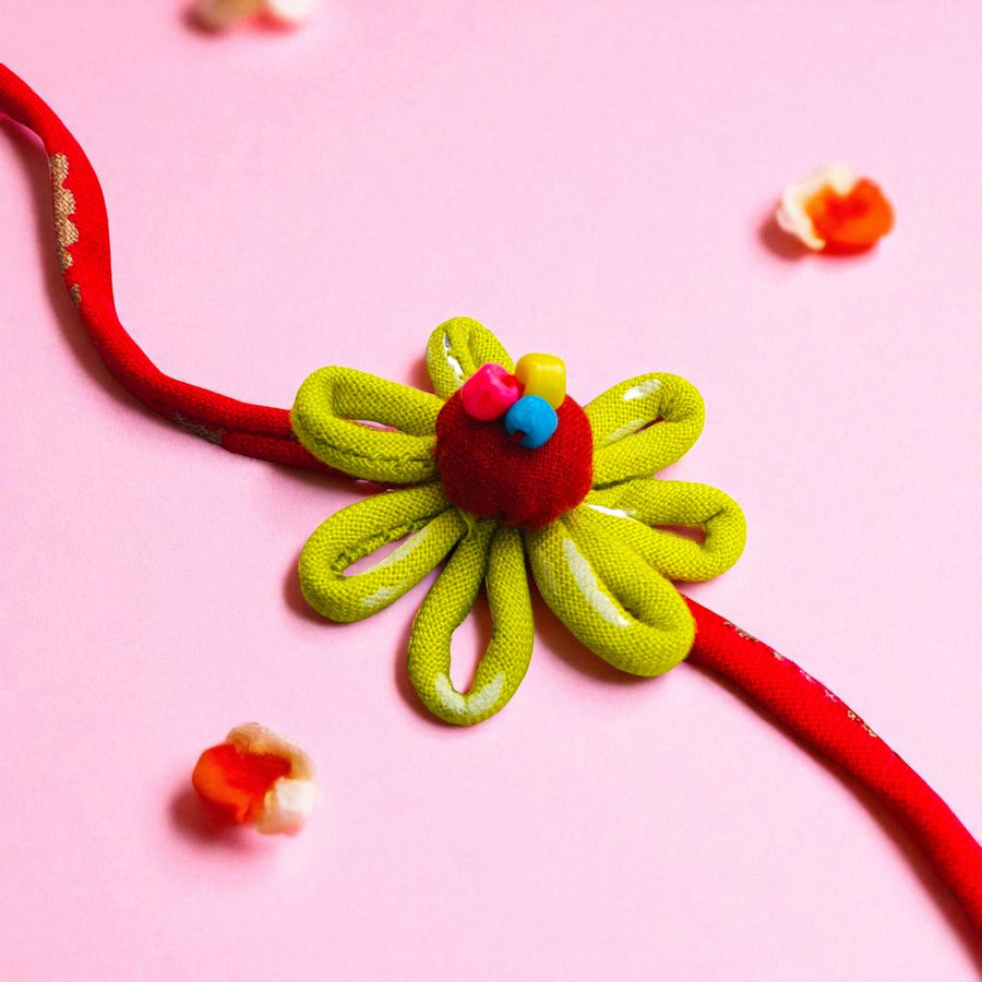 Handmade Loop Petal Flower Design Upcycled Fabric Rakhi With Roli Chawal For Brother - Close-up of Flower Detail