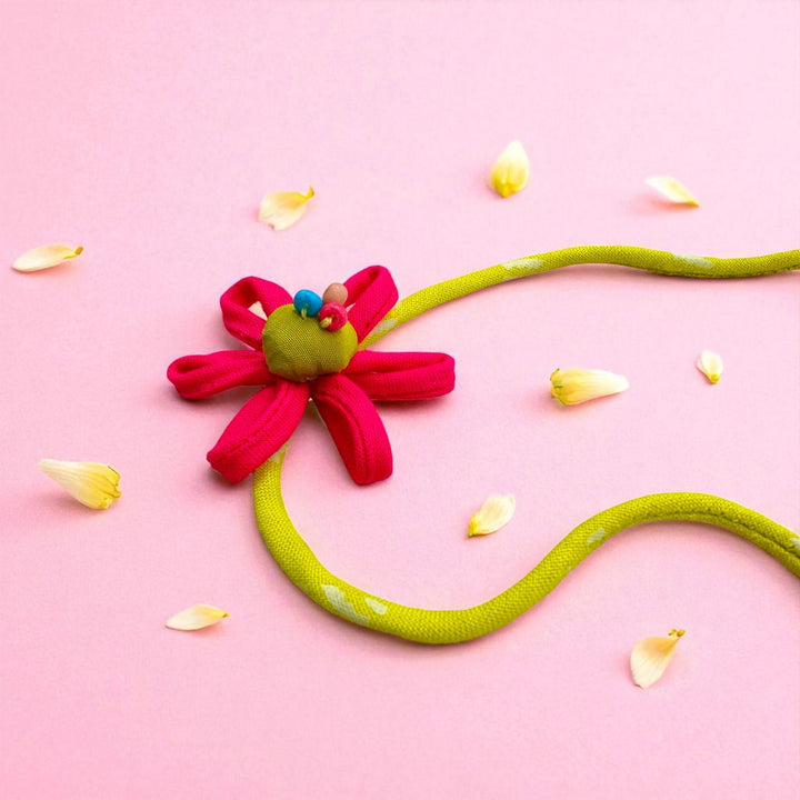 Handmade Beaded Pink Petal Flower Design Upcycled Fabric Rakhi With Roli Chawal For Brother - Full Product with Background