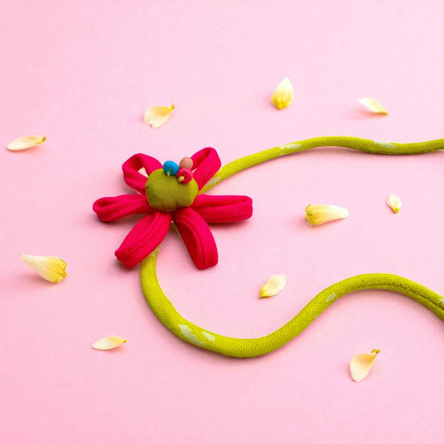 Handmade Beaded Pink Petal Flower Design Upcycled Fabric Rakhi With Roli Chawal For Brother - Full Product with Background