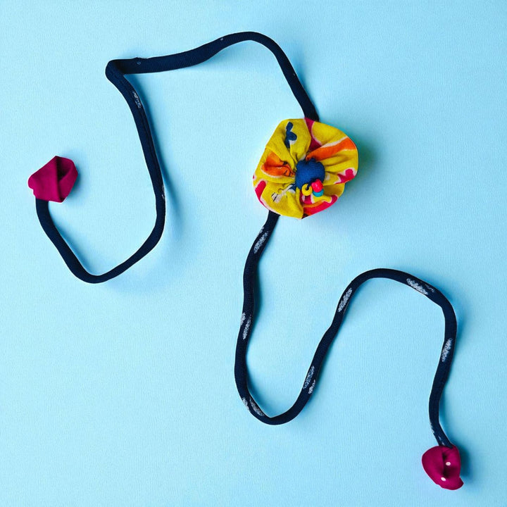 Handmade Yellow Flower Pom Pom Upcycled Fabric Rakhi With Roli Chawal For Brother - Full Product View