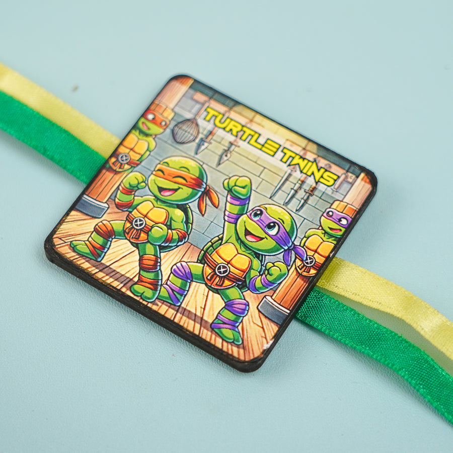 Handmade Reusable Turtle Twins Mdf Wood Rakhi With Roli Chawal For Siblings - Close-up on product detail