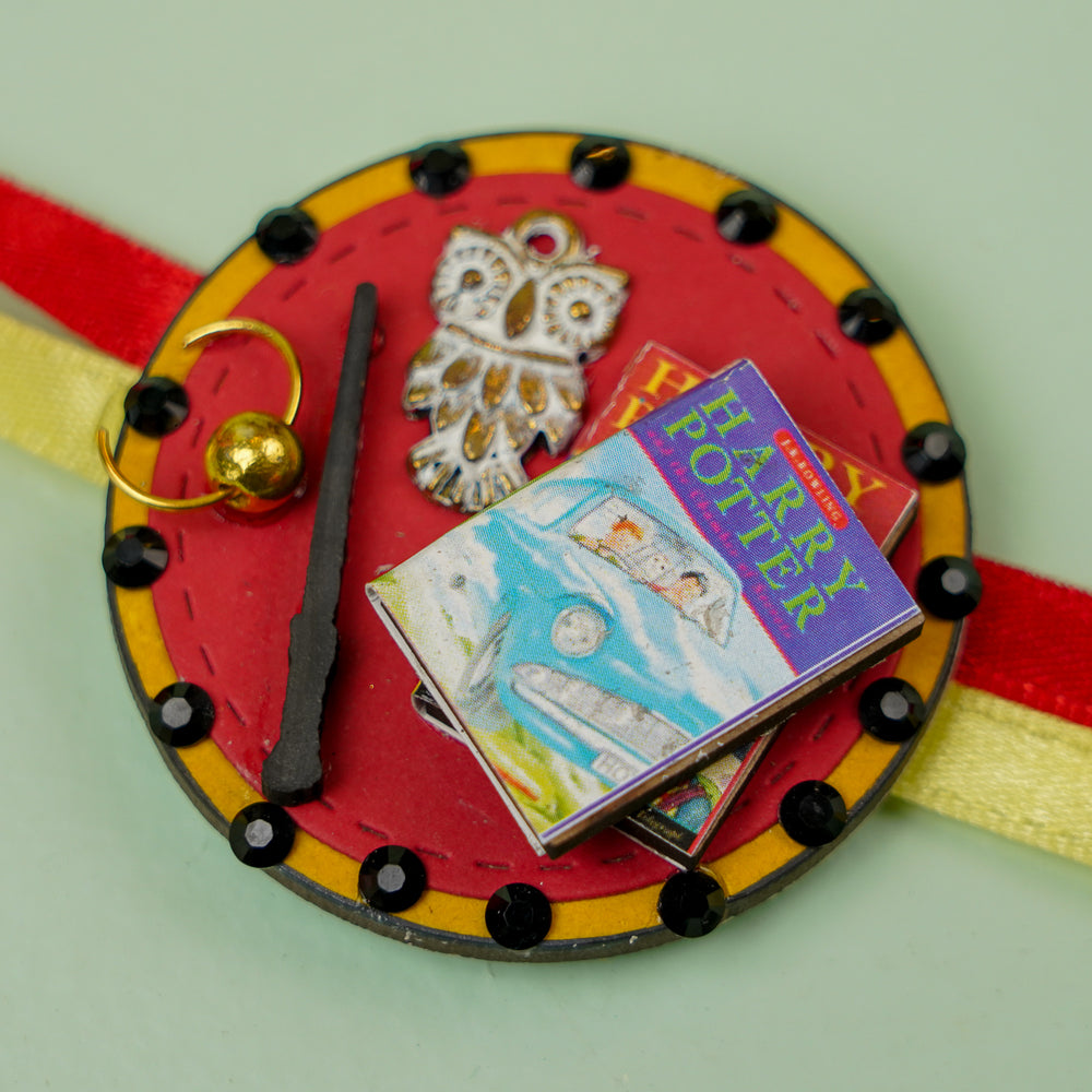 Handmade Harry Potter 3D Elements Mdf Wood Kids Rakhi With Roli Chawal - Close-up of Detailed Decorations