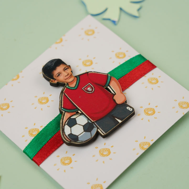 Photo Personalized Handmade Reusable Caricature Football Mdf Wood Kids Rakhi With Roli Chawal 1 - Angled Close-up View