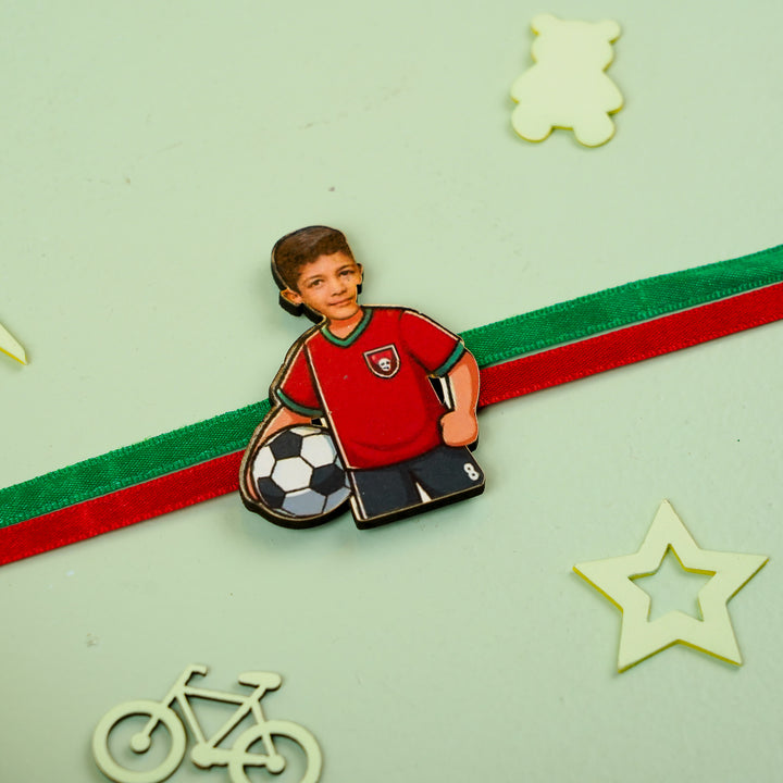 Photo Personalized Handmade Reusable Caricature Football Mdf Wood Kids Rakhi With Roli Chawal 1 - Flat Lay with Decorative Elements