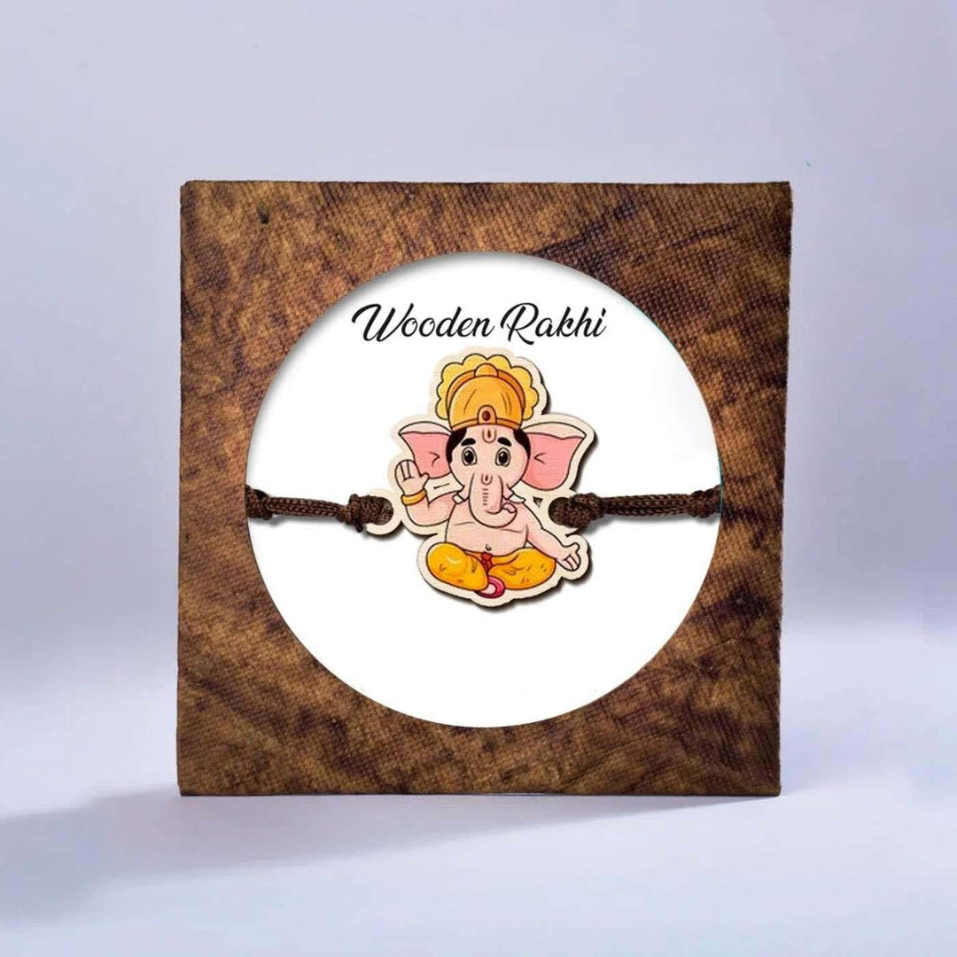 Handmade Ganesha Wooden Rakhi With Roli Chawal - In Packaging Box