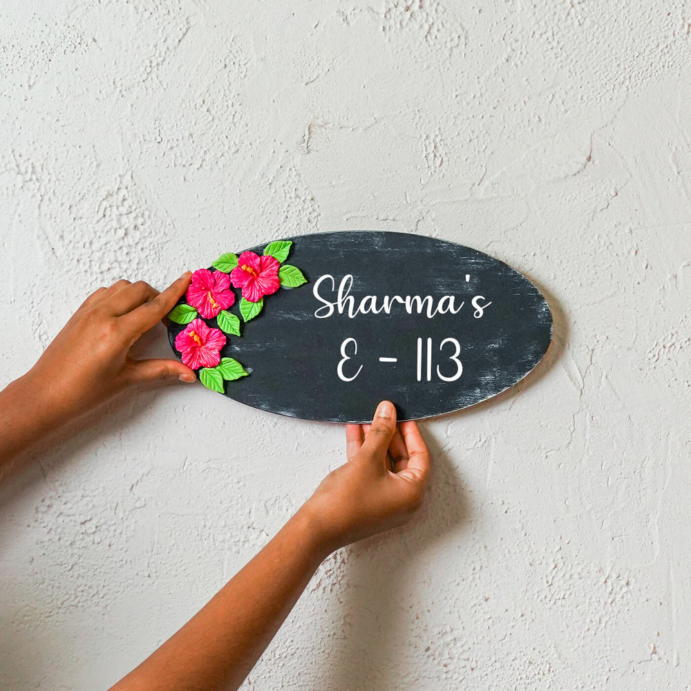 Handcrafted Personalized Wooden Floral Oval Name Plate - Hand-Held Showing Name Personalization
