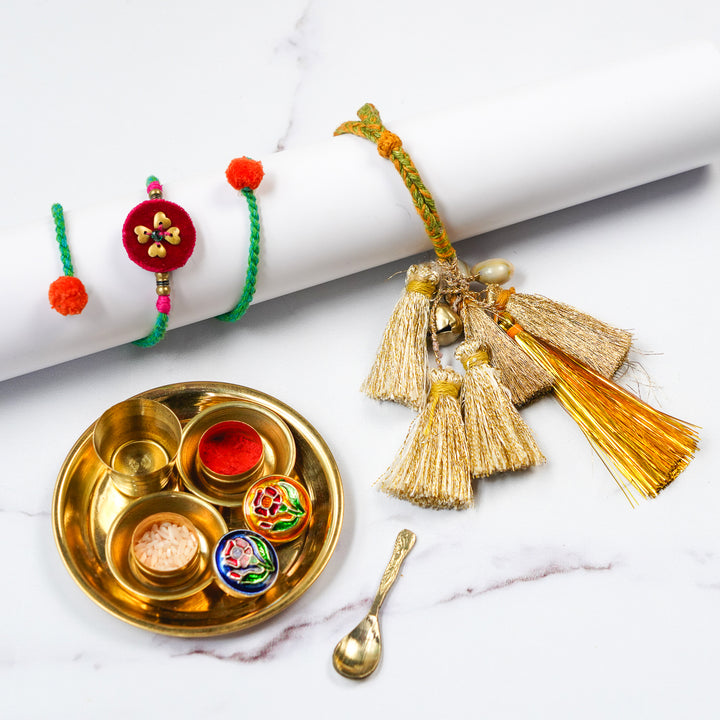 Rakhi & Lumba + Brass Thali Set | Premium Kaju Katli Embroidered Golden Tassels Bhaiya Bhabhi Rakhi Set with Roli Chawal
