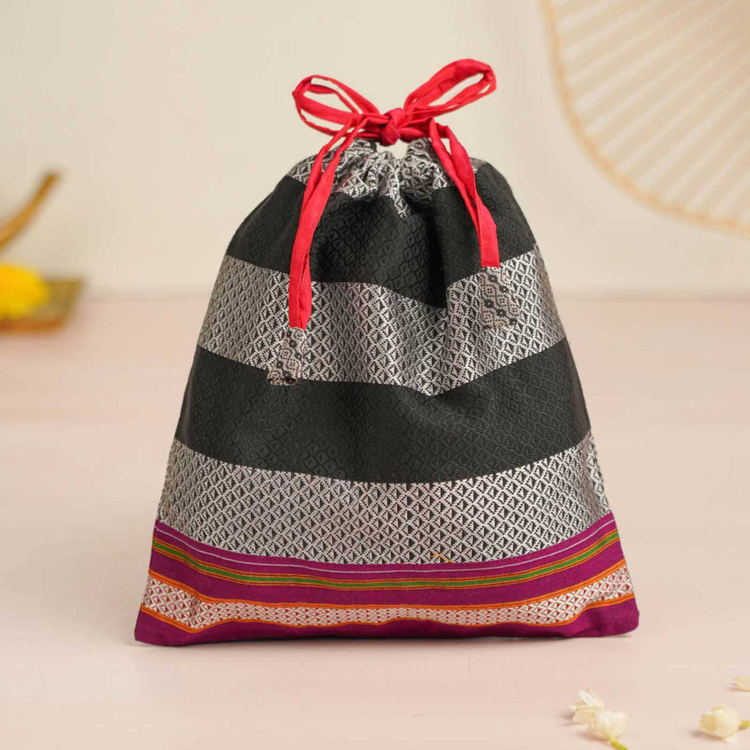 Handmade Black & Silver Khunn Fabric Cotton Thamboolam Potli with Fuchsia Border