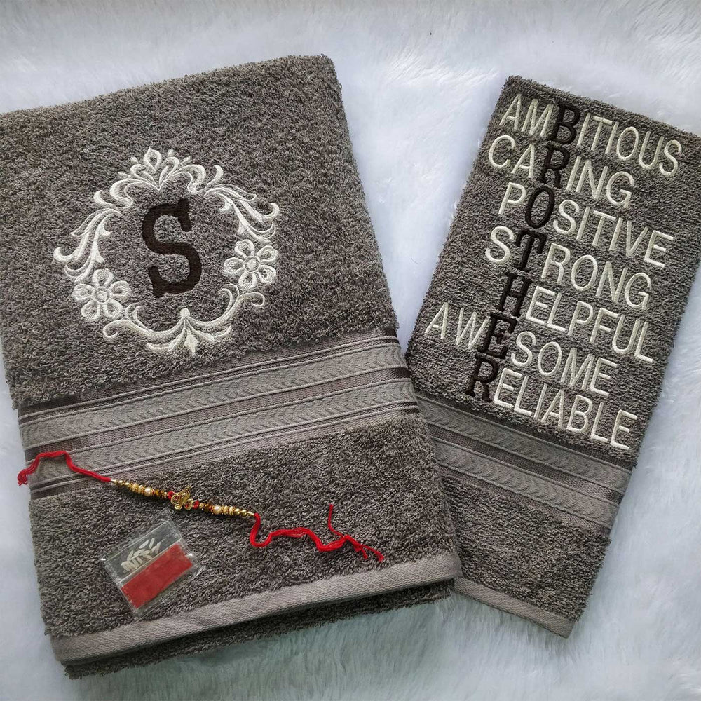 Personalized Embroidered Dark Grey Cotton Towel Rakhi Hamper With Roli Chawal For Brother Includes 1 Hand Towel 1 Bath Towel And 1 Rakhi - Towels with Embroidery Details