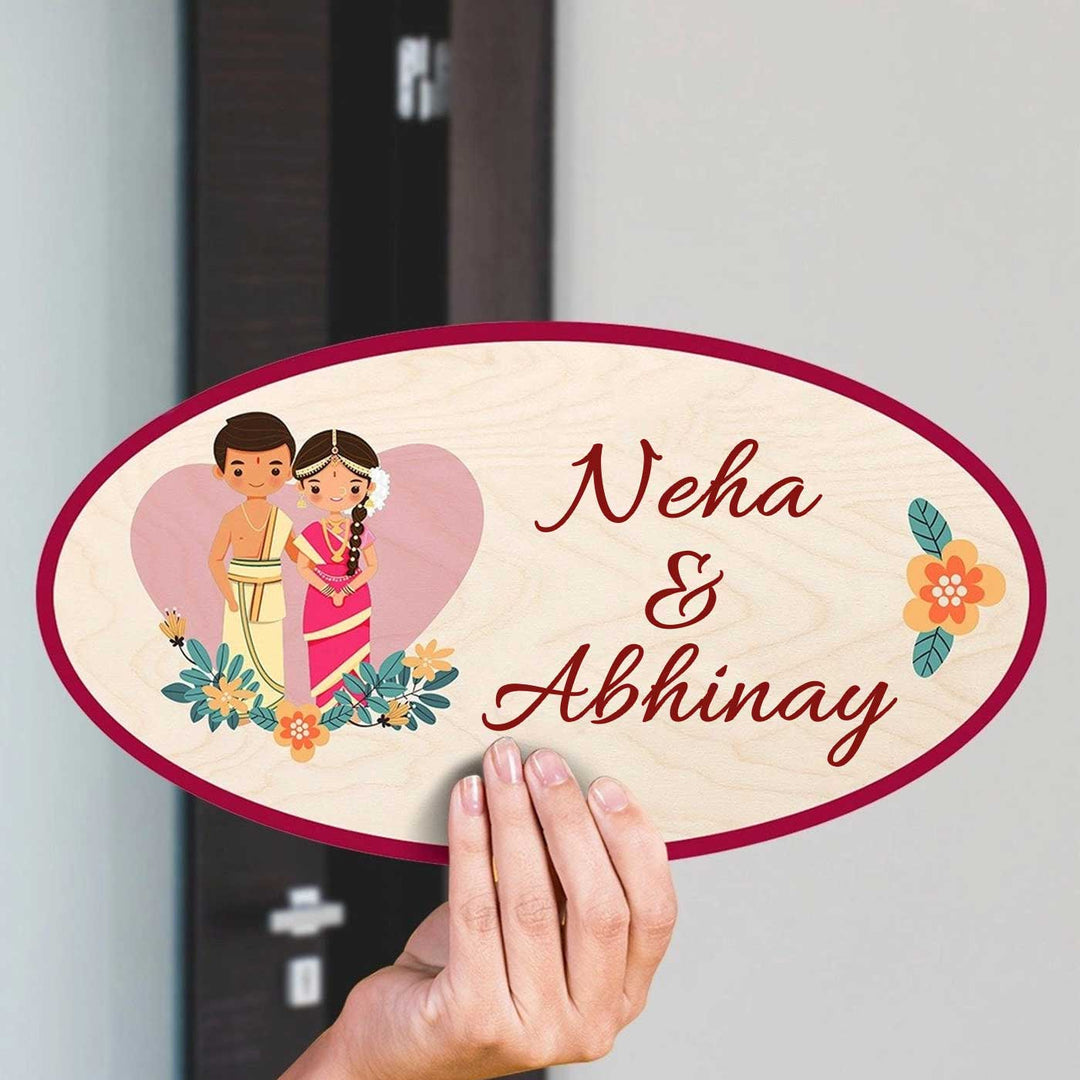 Printed Wooden Oval South Indian Couple Nameplate For Couples - Name Personalization Example Held in Hand