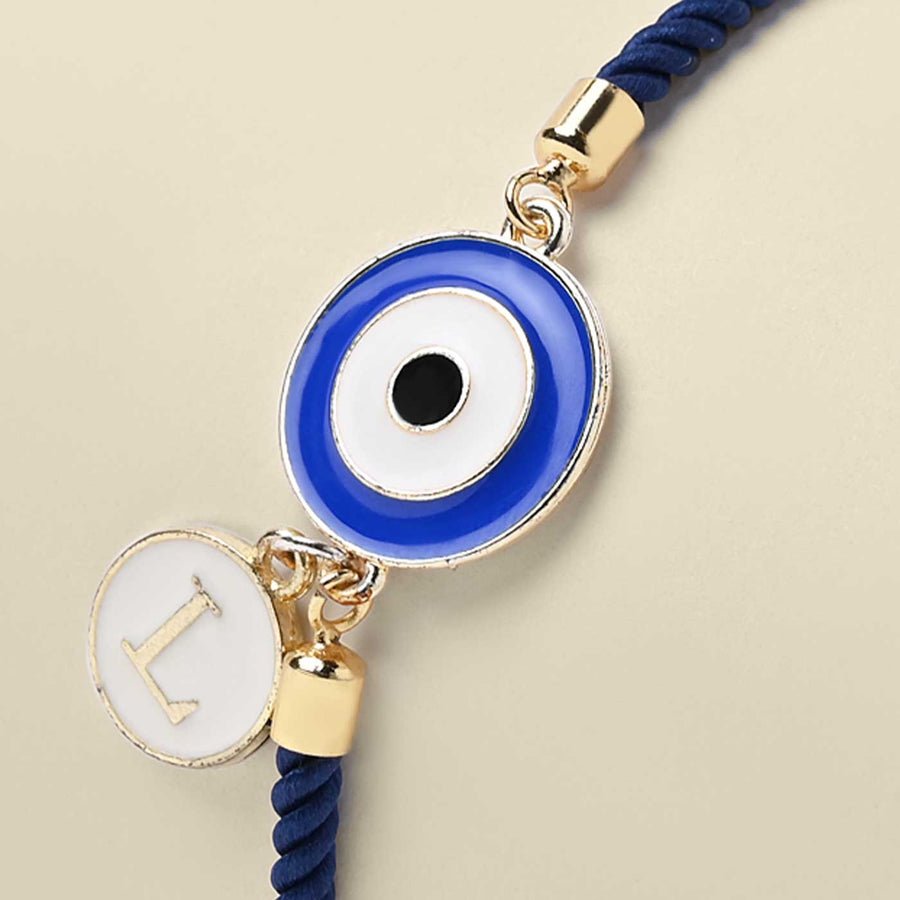 Personalized Handmade Evil Eye Design Monogram Metal Rakhi - Close-up of charm detail