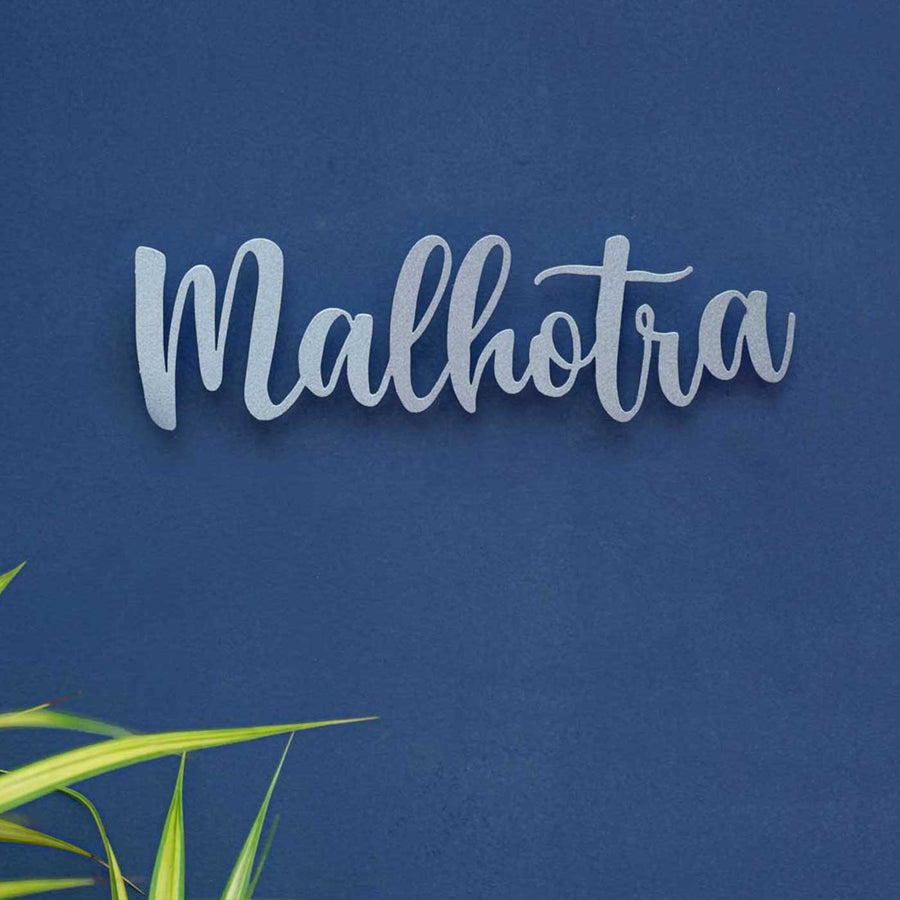 Personalized Weatherproof Elegant Laser Cut Metal Name Plate 2 - Mounted on Blue Wall Background