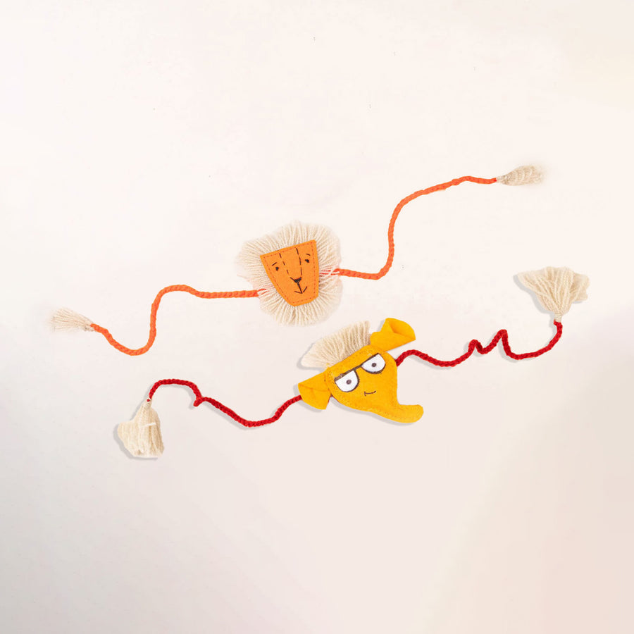 Handcrafted Kids Rakhi With Roli Chawal Set Of 2 - Flat Lay Showing Both Rakhis