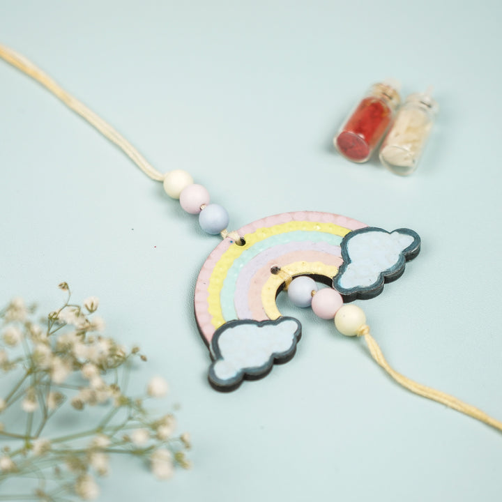 Hand Painted Rainbow Design Mdf Wood Kids Rakhi - Close-up View with Decorative Elements