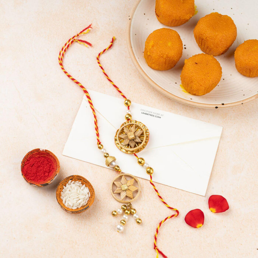 Ecofriendly Bamboo Rakhis For Bhaiya Bhabhi With Roli Chawal 7 - Styled Display with Sweets and Envelope