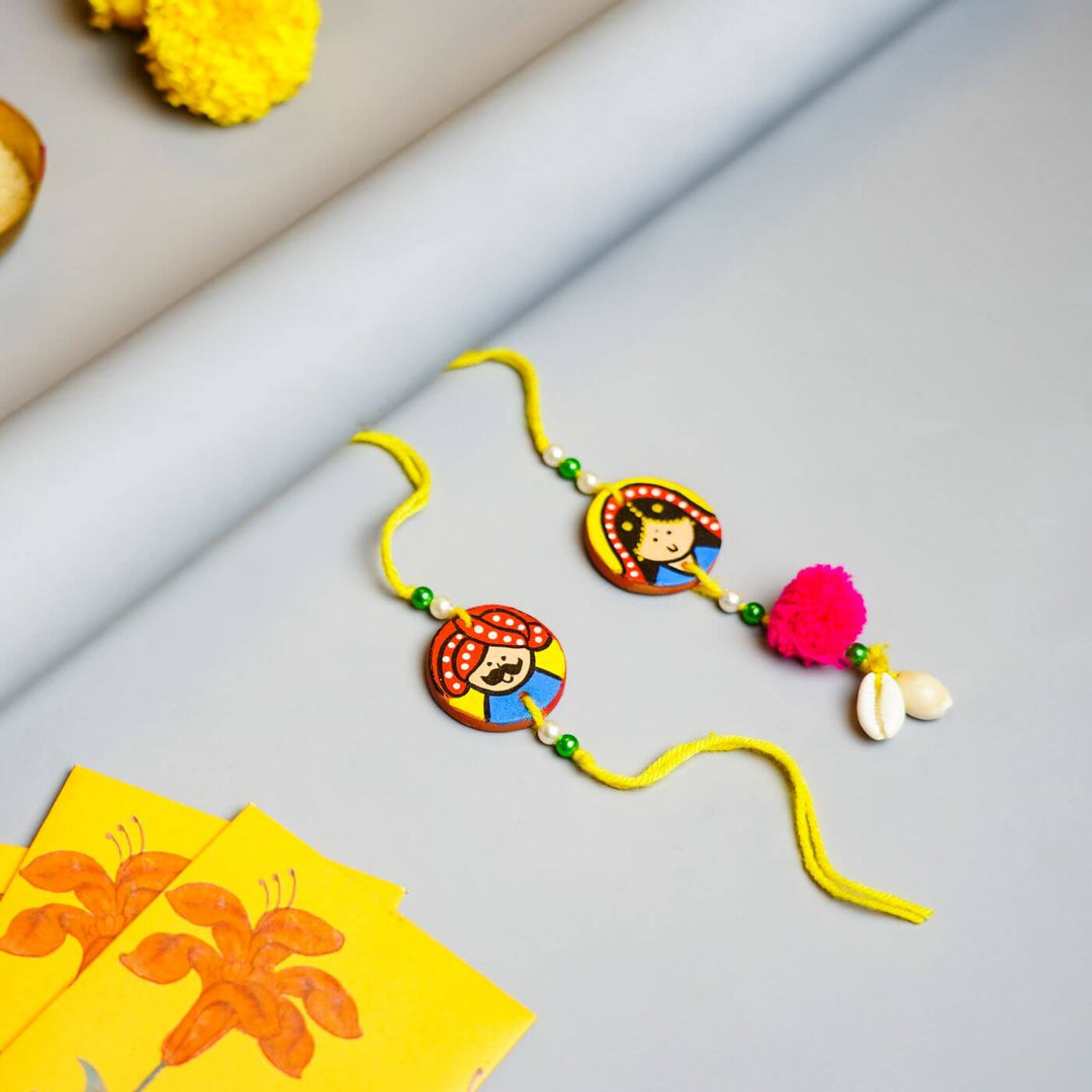 Personalized Terracotta Rakhi Hamper With Caricature 7 - Rakhis on Surface Display