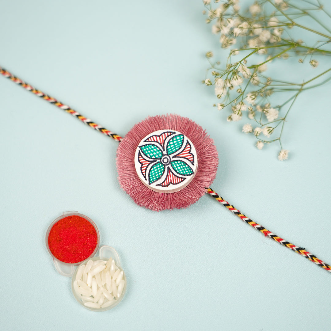 Hand Painted Madhubani Pink Flower Design Wooden Rakhi With Roli Chawal For Brother - Front View with Rakhi Accessories