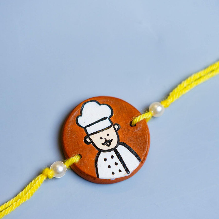Personalized Profession Theme Terracotta Rakhi With Roli Chawal 3 - Close-up of Pendant Design